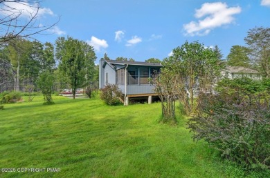 Welcome to 299 Echo Lake Rd, a striking mid-century modern-style on Pocono Farms Country Club in Pennsylvania - for sale on GolfHomes.com, golf home, golf lot