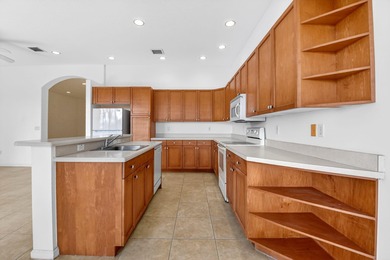 Welcome home to Madison Green! This 3-bedroom, 2-bath home is on The Links At Madison Green in Florida - for sale on GolfHomes.com, golf home, golf lot