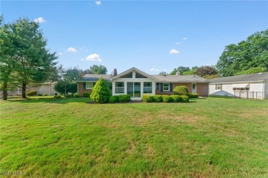 Tucked away in one of Hubbard's quiet, desirable neighborhoods on Pine Lakes Golf Club in Ohio - for sale on GolfHomes.com, golf home, golf lot