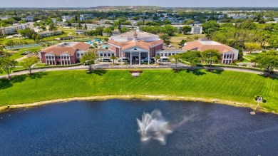 Discover exceptional lakeside living in this rare, rentable on Hillsboro Pines Golf in Florida - for sale on GolfHomes.com, golf home, golf lot