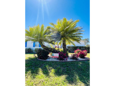 This charming two-bedroom, two-bathroom home is situated on a on Pine Lakes Country Club in Florida - for sale on GolfHomes.com, golf home, golf lot