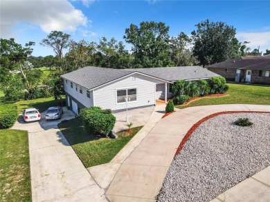 This property listing highlights a spacious home located near on Deltona Golf Club in Florida - for sale on GolfHomes.com, golf home, golf lot