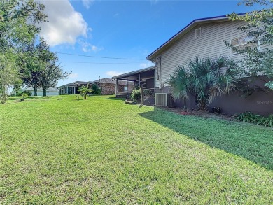 This property listing highlights a spacious home located near on Deltona Golf Club in Florida - for sale on GolfHomes.com, golf home, golf lot