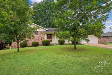 Conveniently located near the golf course, this brick home has on Harrison Country Club in Arkansas - for sale on GolfHomes.com, golf home, golf lot