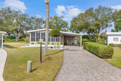 Welcome to 8517 Buckingham Place, a beautifully updated home in on Imperial Lakewoods Golf Club in Florida - for sale on GolfHomes.com, golf home, golf lot