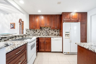 EXPERIENCE EPIC VIEWS from this Gorgeous Updated Lakefront Condo on Palm-Aire Country Club and Resort - Palms in Florida - for sale on GolfHomes.com, golf home, golf lot