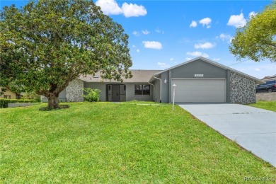 Welcome to your dream home on the golf course! This beautifully on Oak Hills Country Club in Florida - for sale on GolfHomes.com, golf home, golf lot