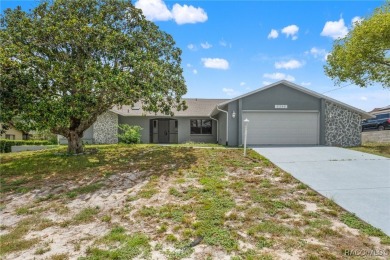 Welcome to your dream home on the golf course! This beautifully on Oak Hills Country Club in Florida - for sale on GolfHomes.com, golf home, golf lot