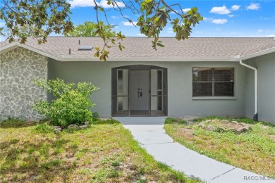 Welcome to your dream home on the golf course! This beautifully on Oak Hills Country Club in Florida - for sale on GolfHomes.com, golf home, golf lot