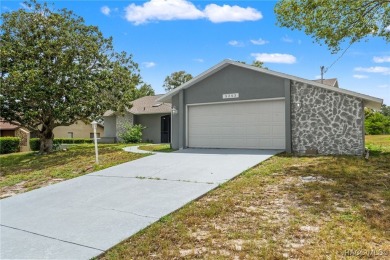 Welcome to your dream home on the golf course! This beautifully on Oak Hills Country Club in Florida - for sale on GolfHomes.com, golf home, golf lot