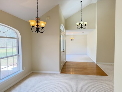 Enjoy the perfect sunset from the massive  picture windows on Pine Creek Golf Club in Mississippi - for sale on GolfHomes.com, golf home, golf lot