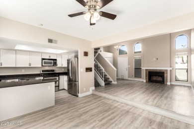 This move-in ready tri-level condo offers comfortable living in on Dobson Ranch Municipal Golf Course in Arizona - for sale on GolfHomes.com, golf home, golf lot