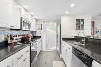 Beautifully Updated Condo with Stunning Golf Course  Pond Views on Pasadena Yacht and Country Club in Florida - for sale on GolfHomes.com, golf home, golf lot