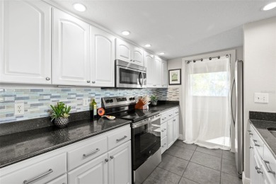 Beautifully Updated Condo with Stunning Golf Course  Pond Views on Pasadena Yacht and Country Club in Florida - for sale on GolfHomes.com, golf home, golf lot