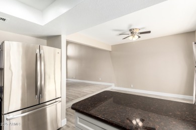 This move-in ready tri-level condo offers comfortable living in on Dobson Ranch Municipal Golf Course in Arizona - for sale on GolfHomes.com, golf home, golf lot