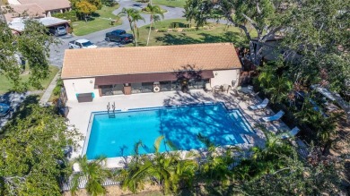 Beautifully Updated Condo with Stunning Golf Course  Pond Views on Pasadena Yacht and Country Club in Florida - for sale on GolfHomes.com, golf home, golf lot