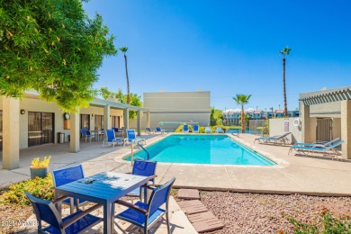 This move-in ready tri-level condo offers comfortable living in on Dobson Ranch Municipal Golf Course in Arizona - for sale on GolfHomes.com, golf home, golf lot