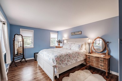 Exquisite three-level condo overlooking the 11th fairway of on Bridgton Highlands Country Club in Maine - for sale on GolfHomes.com, golf home, golf lot