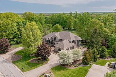 Situated in the heart of Barrington Estates, this magnificent on Barrington Golf Club in Ohio - for sale on GolfHomes.com, golf home, golf lot