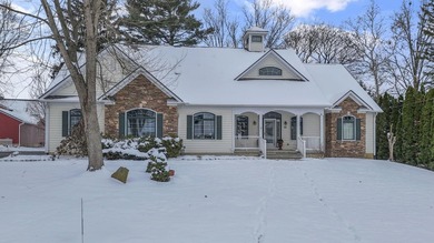 Stunning custom Cape Cod style home in a sought-after lake and on Harbor Hills Country Club in Ohio - for sale on GolfHomes.com, golf home, golf lot