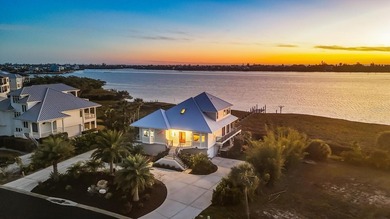 Spectacular Southwest Florida sunsets take center stage at this on Lemon Bay Golf Club in Florida - for sale on GolfHomes.com, golf home, golf lot