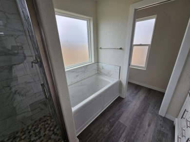 Brand new construction. Located in Hidden Bridge Ranch across on Hidden Bridge Golf Club in Wyoming - for sale on GolfHomes.com, golf home, golf lot