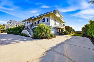 Spectacular Southwest Florida sunsets take center stage at this on Lemon Bay Golf Club in Florida - for sale on GolfHomes.com, golf home, golf lot