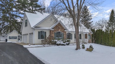 Stunning custom Cape Cod style home in a sought-after lake and on Harbor Hills Country Club in Ohio - for sale on GolfHomes.com, golf home, golf lot