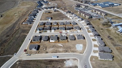 Brand new construction. Located in Hidden Bridge Ranch across on Hidden Bridge Golf Club in Wyoming - for sale on GolfHomes.com, golf home, golf lot