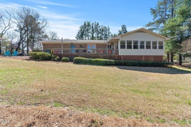 This charming 3-bedroom, 2-bathroom home is situated on a on Quail Ridge Golf Course in North Carolina - for sale on GolfHomes.com, golf home, golf lot
