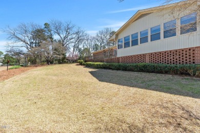 This charming 3-bedroom, 2-bathroom home is situated on a on Quail Ridge Golf Course in North Carolina - for sale on GolfHomes.com, golf home, golf lot