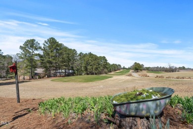 This charming 3-bedroom, 2-bathroom home is situated on a on Quail Ridge Golf Course in North Carolina - for sale on GolfHomes.com, golf home, golf lot