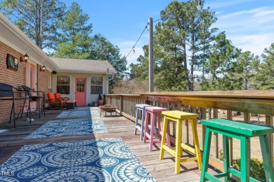 This charming 3-bedroom, 2-bathroom home is situated on a on Quail Ridge Golf Course in North Carolina - for sale on GolfHomes.com, golf home, golf lot
