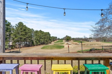 This charming 3-bedroom, 2-bathroom home is situated on a on Quail Ridge Golf Course in North Carolina - for sale on GolfHomes.com, golf home, golf lot