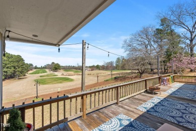 This charming 3-bedroom, 2-bathroom home is situated on a on Quail Ridge Golf Course in North Carolina - for sale on GolfHomes.com, golf home, golf lot