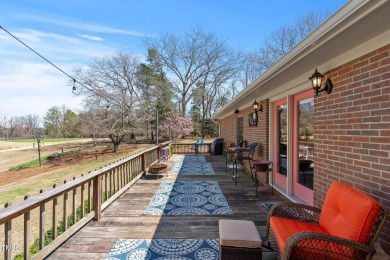 This charming 3-bedroom, 2-bathroom home is situated on a on Quail Ridge Golf Course in North Carolina - for sale on GolfHomes.com, golf home, golf lot