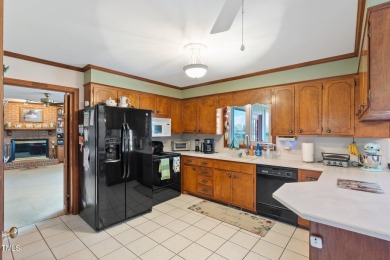 This charming 3-bedroom, 2-bathroom home is situated on a on Quail Ridge Golf Course in North Carolina - for sale on GolfHomes.com, golf home, golf lot