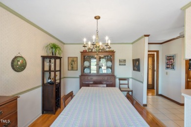 This charming 3-bedroom, 2-bathroom home is situated on a on Quail Ridge Golf Course in North Carolina - for sale on GolfHomes.com, golf home, golf lot