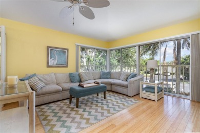 This beautifully furnished three-bedroom, two-bathroom on Capri Isle Golf Club in Florida - for sale on GolfHomes.com, golf home, golf lot