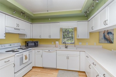 This beautifully furnished three-bedroom, two-bathroom on Capri Isle Golf Club in Florida - for sale on GolfHomes.com, golf home, golf lot