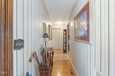This charming 3-bedroom, 2-bathroom home is situated on a on Quail Ridge Golf Course in North Carolina - for sale on GolfHomes.com, golf home, golf lot