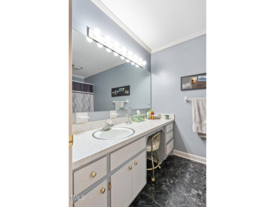 This charming 3-bedroom, 2-bathroom home is situated on a on Quail Ridge Golf Course in North Carolina - for sale on GolfHomes.com, golf home, golf lot
