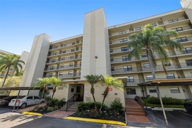 STUNNING CONDO IN COVE CAY! Welcome to this charming 2-bedroom on Cove Cay Country Club in Florida - for sale on GolfHomes.com, golf home, golf lot