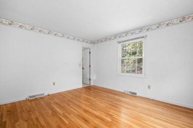 Set back from the road, a charming porch awaits your vision, and on Cranberry Valley Golf Course in Massachusetts - for sale on GolfHomes.com, golf home, golf lot