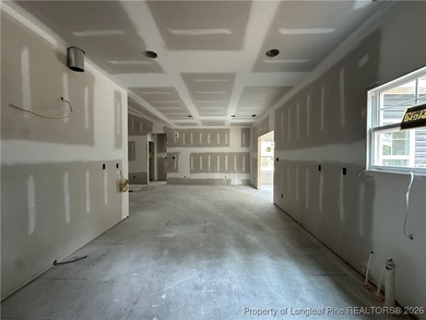 This Ranch floorplan offers spacious open floorplan living all on Deercroft Golf and Country Club in North Carolina - for sale on GolfHomes.com, golf home, golf lot