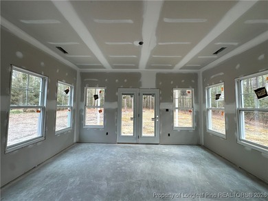This Ranch floorplan offers spacious open floorplan living all on Deercroft Golf and Country Club in North Carolina - for sale on GolfHomes.com, golf home, golf lot
