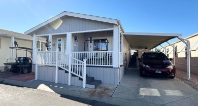 Welcome to this beautifully renovated and meticulously on Voyager RV Resort and Golf Course in Arizona - for sale on GolfHomes.com, golf home, golf lot