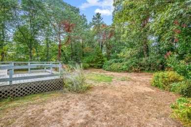 Set back from the road, a charming porch awaits your vision, and on Cranberry Valley Golf Course in Massachusetts - for sale on GolfHomes.com, golf home, golf lot