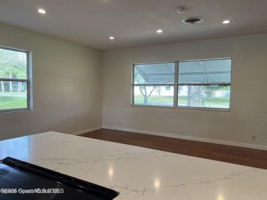 Escape to your private oasis in Country Club Colony - no HOA! on Crane Creek Reserve Golf Club in Florida - for sale on GolfHomes.com, golf home, golf lot