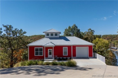 This beautiful 4-bedroom home offers great water views from one on The Oaks Golf Course in Missouri - for sale on GolfHomes.com, golf home, golf lot